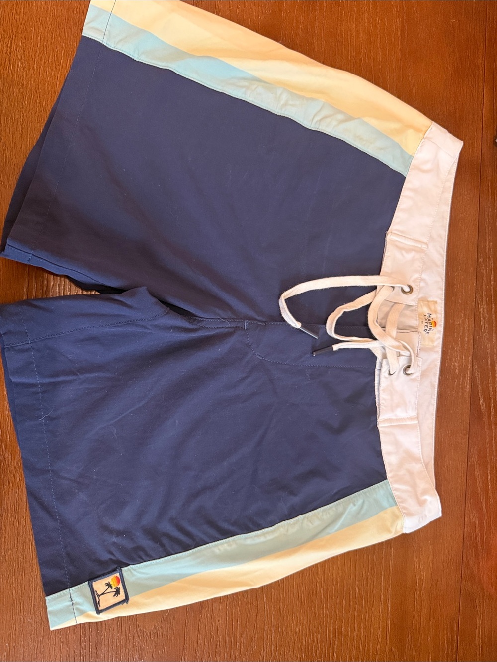 Marine Layer Navy Blue Swim Trunks with Pale Blue and Cream Panels